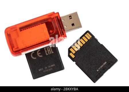 Multi card USB reader adapter with two SD cards isolated on white background Stock Photo