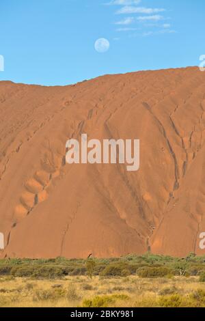 Moon rising over Uluru (Ayers Rock), Northern Territory, Australia Stock Photo