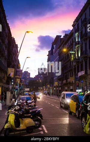 Carrer de Pelai in Barcelona just as the sun is setting. Stock Photo