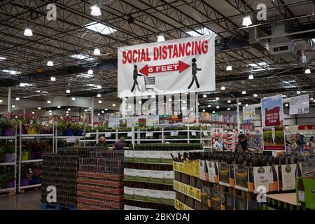 Social distancing banner is seen in a Costco store in Tigard, Oregon, during the COVID-19 crisis, on Tuesday, May 5, 2020. Stock Photo