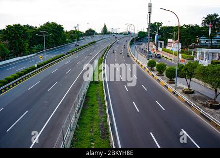 Empty or deserted Letjen S. Parman street in West Jakarta. People have been working from home to avoid covid-19. Stock Photo