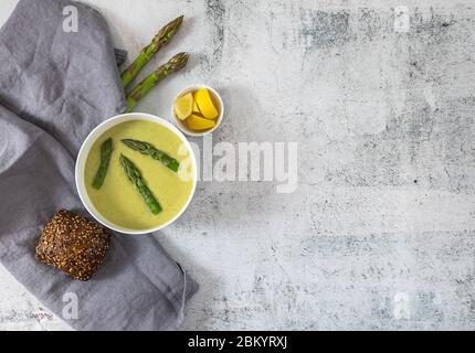 Cream soup of fresh asparagus and cheese. Stock Photo
