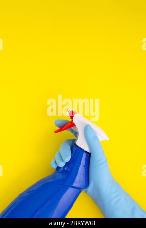 Colourful cleaning set for different surfaces in kitchen, bathroom and other rooms. Spring cleaning service vertical concept. Early spring regular Stock Photo