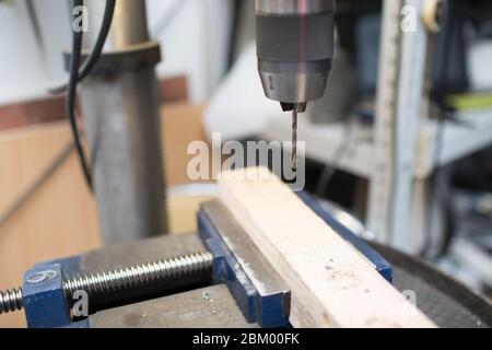 Drilling machine with laser sight in the workshop Stock Photo
