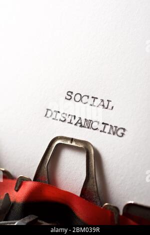 Social distancing text written with a typewriter. Stock Photo