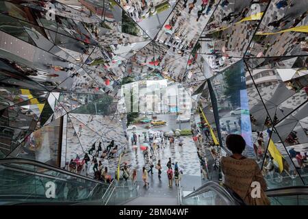 The mirrored entrance hall to the Tokyu Plaza building in Omotesando, Tokyo, Japan. Stock Photo
