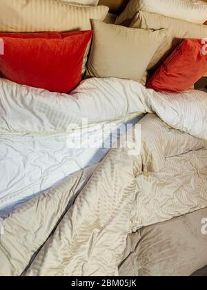 Bed in the bedroom with pillows interior of the house Stock Photo