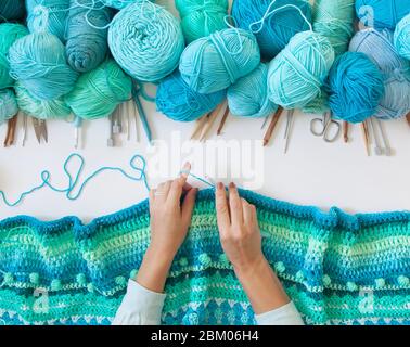 Top view of a large green knitting stitch holder isolated on a white  background Stock Photo - Alamy