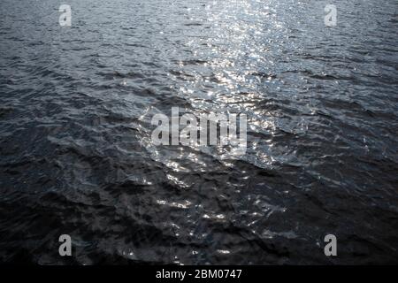 sun sparkling on water surface, Lappeenranta Finland Stock Photo