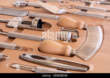 Professional cooking tools set for a modern kitchen in a brown wooden stylish box Stock Photo