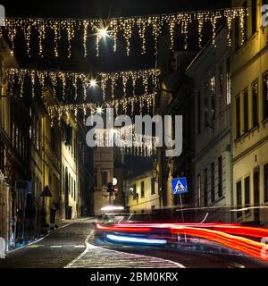 Driving in the streets during nighttime Stock Photo