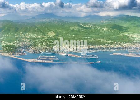 View of the skyline of Palma de Mallorca from airplane window. Castell de Bellver on the background. Port and cruise ship Stock Photo