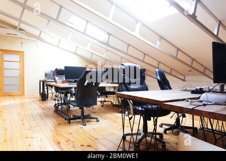 Wooden coworking office interior with furniture and daylight Stock Photo