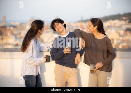 Three young people enjoying outdoors Stock Photo