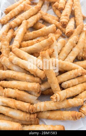 Turkish Fried Feta Rolls, or 'Cigarette' Pastries. Sigara Böreği (Turkish  Cheese Rolls) on counter top during street food festival, turkish sigara  bor Stock Photo