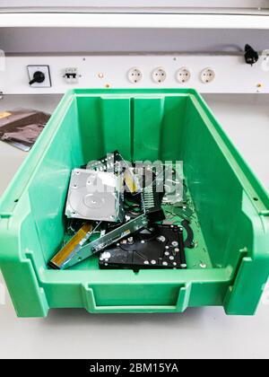 Electronic trash with various destroyed computer components. Stock Photo
