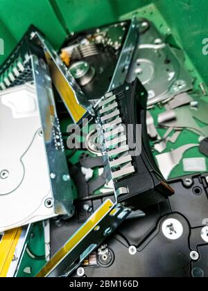 Electronic trash with various destroyed computer components. Stock Photo