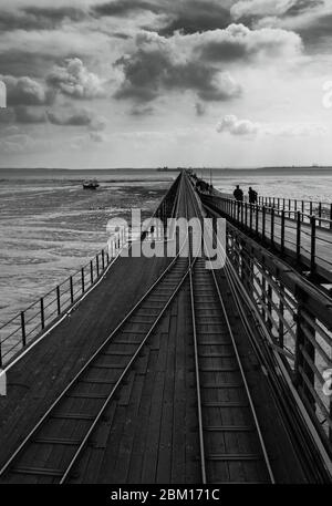 Southend-on-Sea pier with It's train line that reaches out 1.34 mile into the Thames Estuary, Southend-on-Sea Essex UK. April 2019 Stock Photo