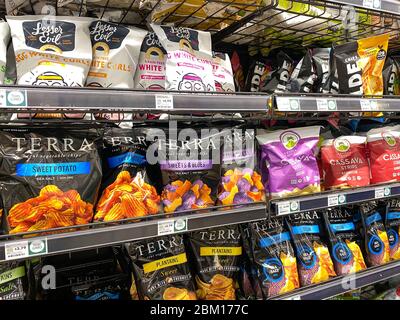 Orlando,FL/USA-5/3/20: A display of Potato, Plantain, and Cassava Chips at a Whole Foods Market Grocery Store. Stock Photo