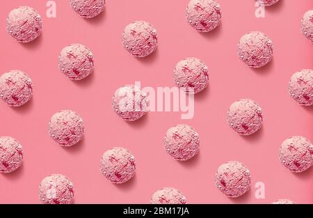 Pattern of strawberry ice cream balls on pink background Stock Photo