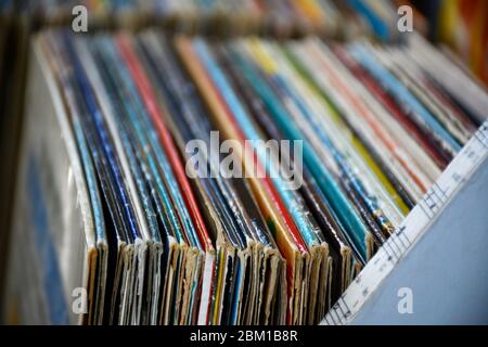Collection of old vintage vinyl turntable record lp's albums in its covers with sleeves in storage shelf Stock Photo