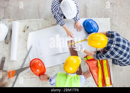 Engineer work as team and technology to design and construction on site for modern and comfortable business office Stock Photo