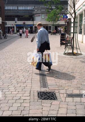1997, Merthyr Tydfil town centre, South Wales with people shopping in the retail area Stock Photo