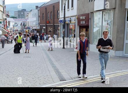 1997, Merthyr Tydfil town centre, South Wales with people shopping in the retail area Stock Photo