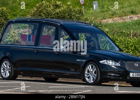 Southend on Sea, Essex, UK. 6th May, 2019. Covid-19 lockdown seafront, Southend on Sea, Essex, a solitary hearse tries slowly along the seafront, Credit: Ian Davidson/Alamy Live News
