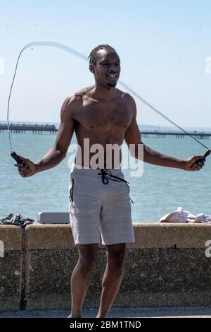 Southend on Sea, Essex, UK. 6th May, 2019. Covid-19 lockdown seafront, Southend on Sea, Essex, a man performing skipping on the sea front Credit: Ian Davidson/Alamy Live News Stock Photo