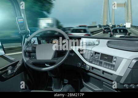 Autonomous truck on a road. Inside view. Stock Photo