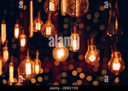 Set edison retro lamp on dark bokeh background Stock Photo