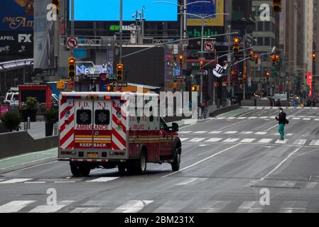 Beijing, USA. 27th Apr, 2020. An ambulance is seen at Times Square in ...