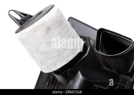 New white car air filter made of textured material close-up for air conditioning and prevent dust from entering the car interior. Replacing a part dur Stock Photo