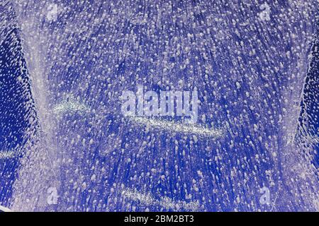 foam and soap on black background. abstract pattern Stock Photo