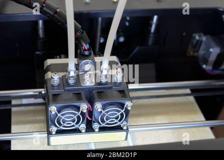 Photo of 3d printer, 3d print, theme of electronic innovation, close-up Stock Photo