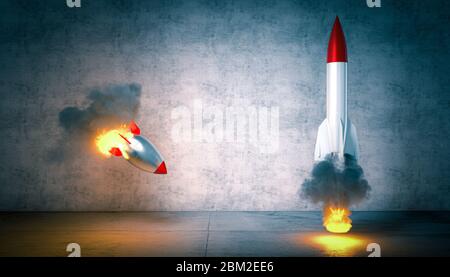 two rockets start but one fails to launch. concept of success, competition, competence and luck. 3d render. nobody around. Stock Photo