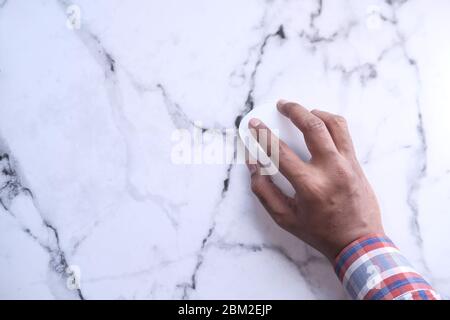 person hand use computer mouse on desk. Stock Photo