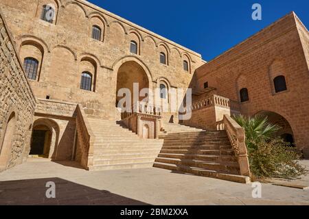 Entrance and courtyarda of Mor Hananyo Monastery (Deyrulzafaran Manastiri), Mardin, Turkey Stock Photo