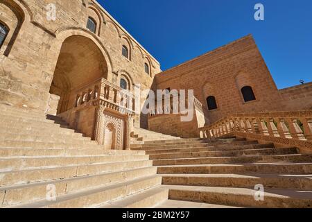 Entrance and courtyarda of Mor Hananyo Monastery (Deyrulzafaran Manastiri), Mardin, Turkey Stock Photo