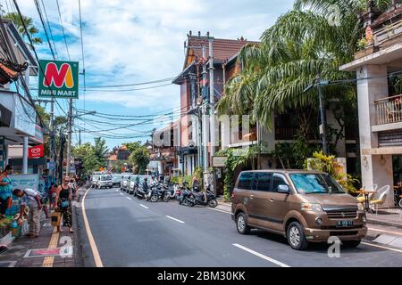 Monkey Forest Road is main road of Ubud Province Stock Photo