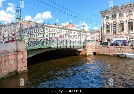 St Petersburg, Russia - August 5, 2015: Green Bridge across Moyka river in summertime. Cityscape of historic centre of Saint Petersburg City Stock Photo