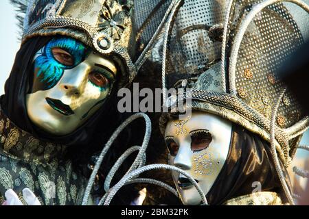 A Pair of Costumed Revelers of the Carnival of Venice Stock Photo