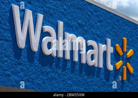 Walmart logo signage on a Walmart store in Snellville (Metro Atlanta), Georgia. (USA) Stock Photo