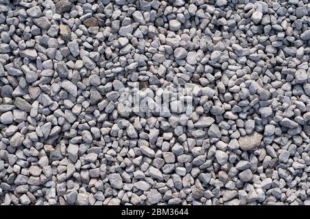 White and grey pebbles stones background and texture Stock Photo