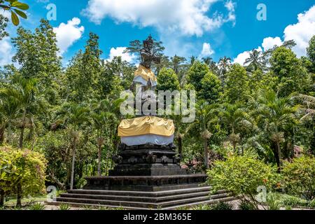 Sculpture or statue of Hindu god in the Holy Springs Temple, local name of this god ' Deva Indra ' Stock Photo