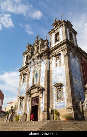 Santo Ildefonso Church in the city of Porto, Portugal. 18th century Baroque architecture, covered with the typical Portuguese blue tiles called Azulej Stock Photo