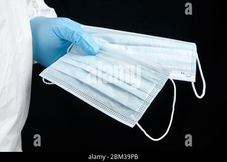 Download Blue Medical Glove And Face Masks On Yellow Covid Stock Photo Alamy PSD Mockup Templates