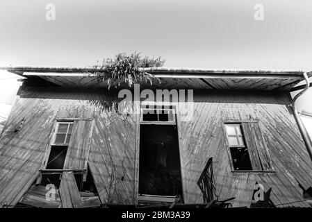 An old and eerie, mysteirous house in the middle of nowhere Stock Photo