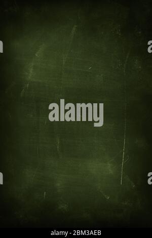 Chalk rubbed out on green chalkboard background Stock Photo